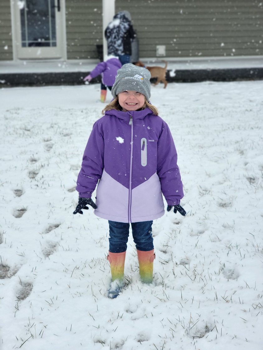 Maecee Burris happy to see the snow.